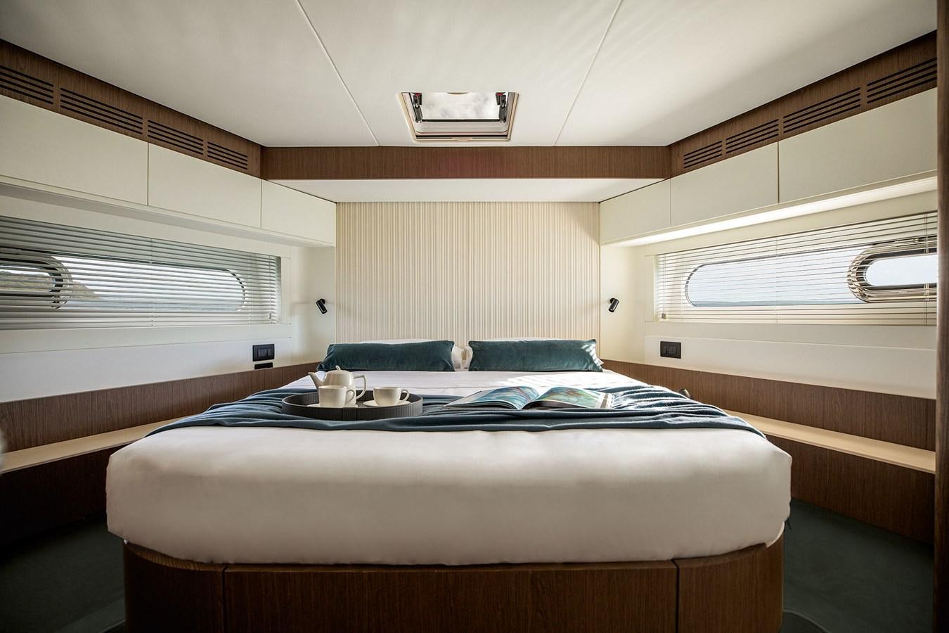 a bed with a sink on it aboard 66 MAGELLANO Yacht for Sale