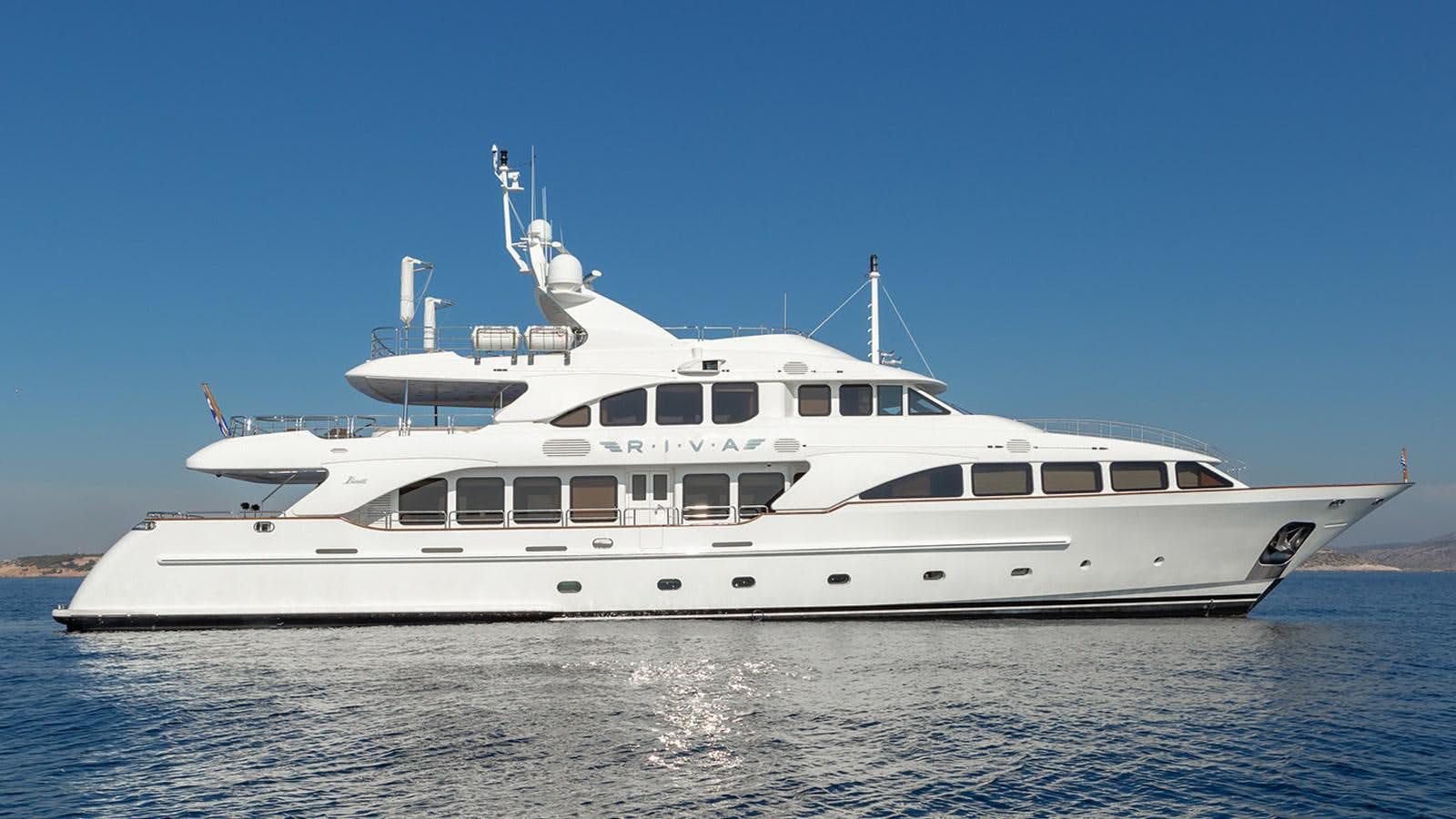 a large white yacht aboard RIVA I Yacht for Sale