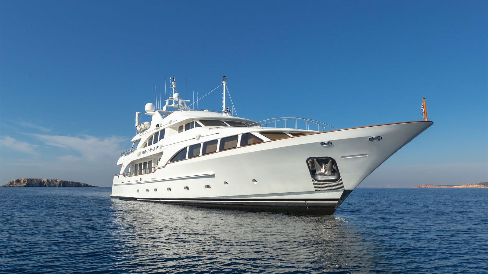 a white yacht in the water aboard RIVA I Yacht for Sale