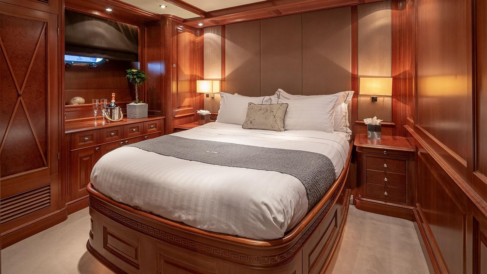 a bed in a room aboard RIVA I Yacht for Sale