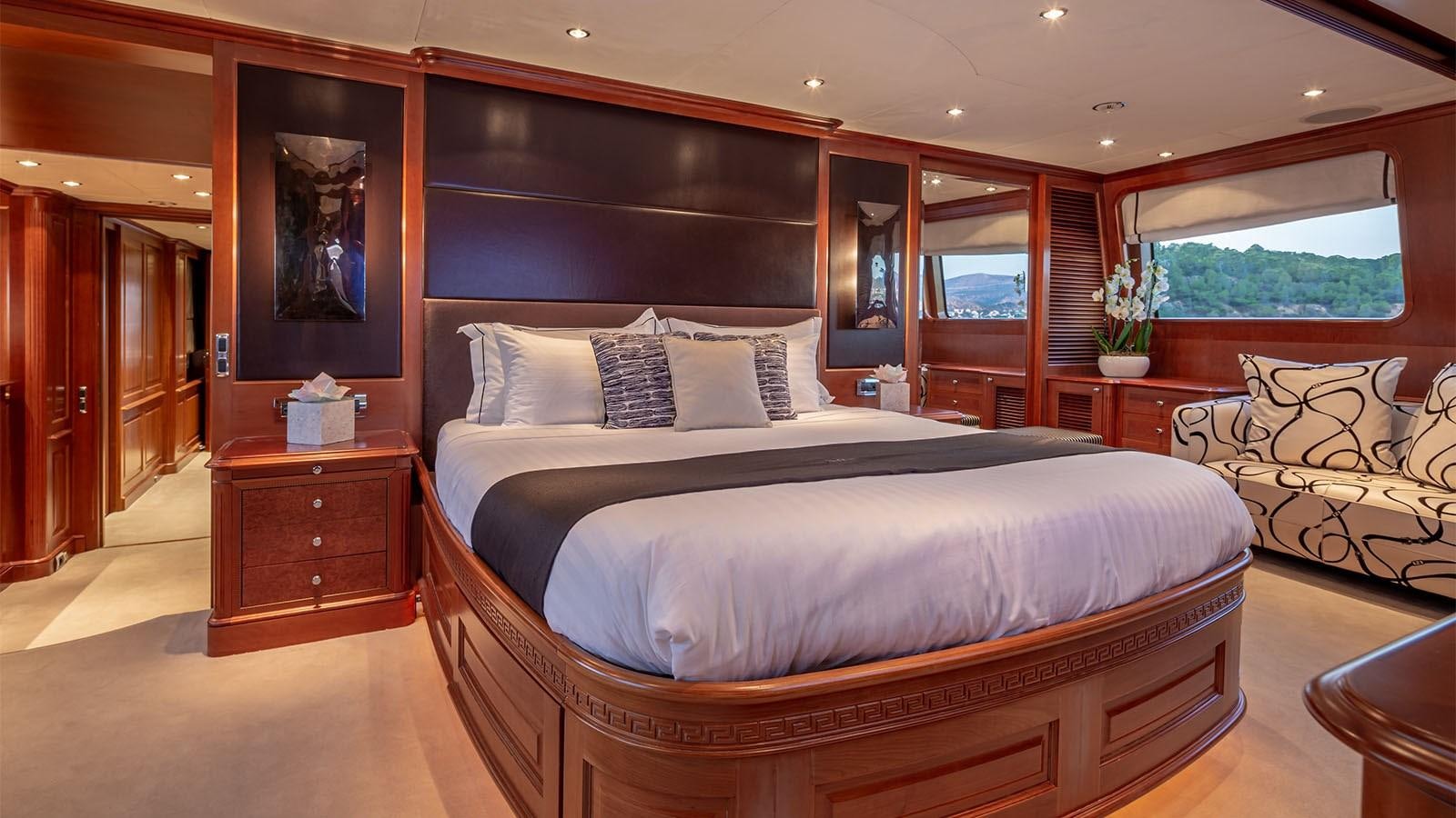 a bed in a room aboard RIVA I Yacht for Sale