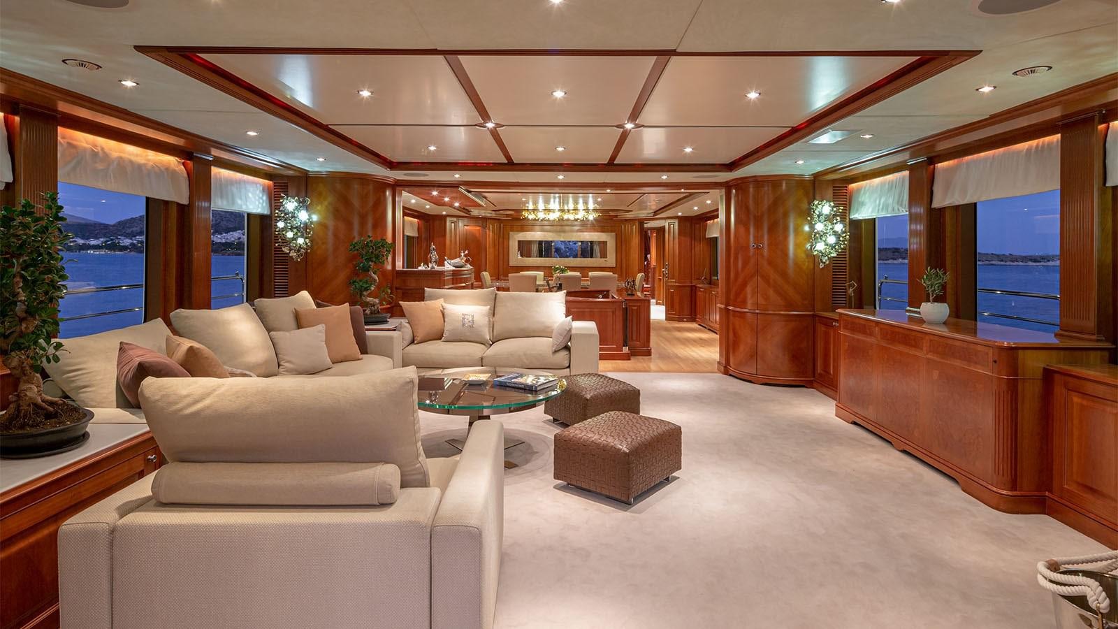 a living room with a large window aboard RIVA I Yacht for Sale