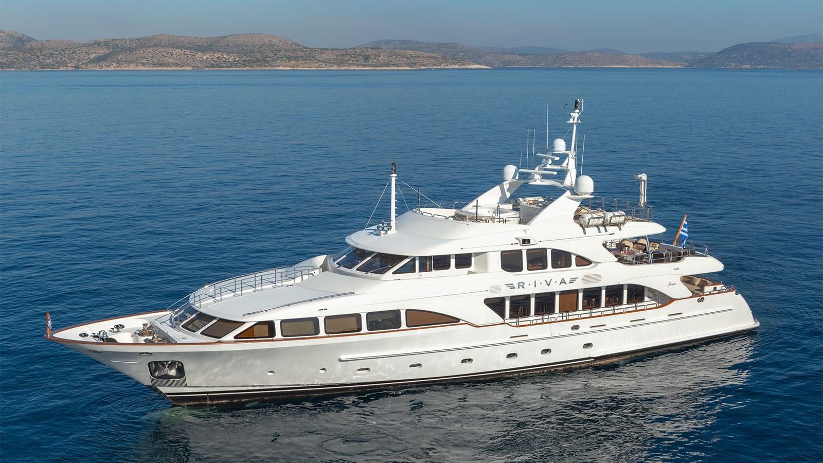 a large white boat in the water aboard RIVA I Yacht for Sale