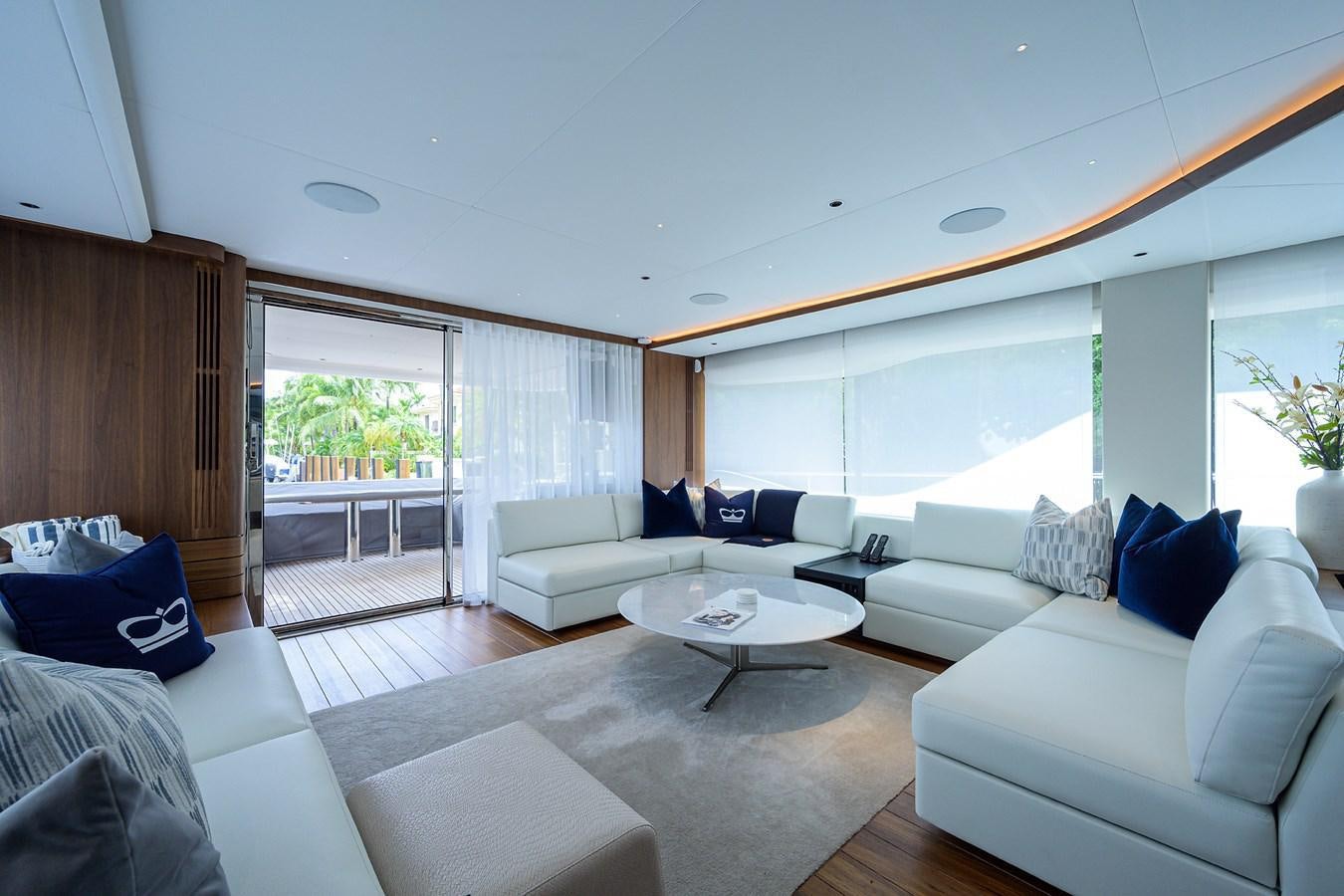 a living room with a large window aboard ESCAPE Yacht for Sale