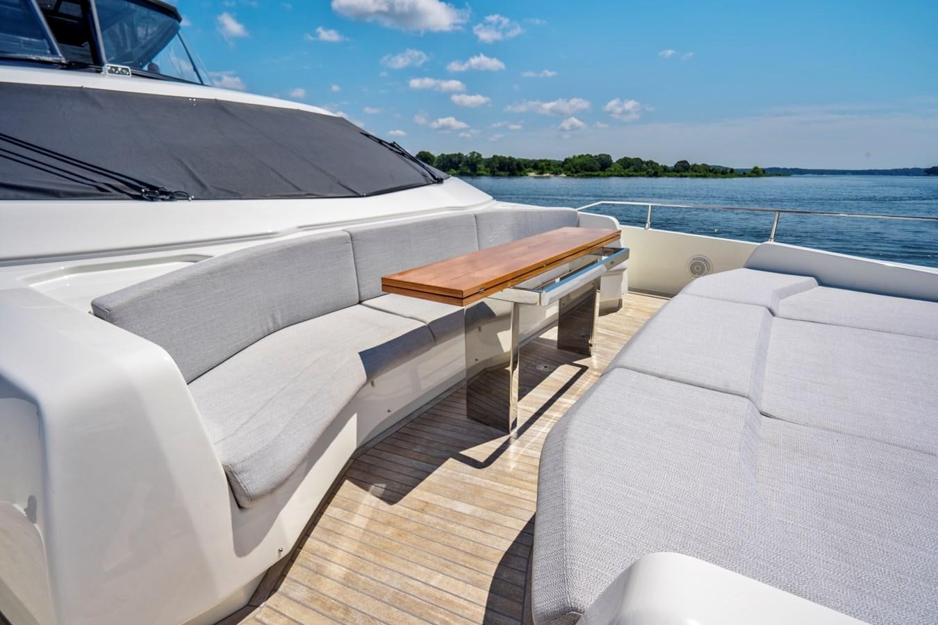 a boat on a deck aboard PINCH ME Yacht for Sale