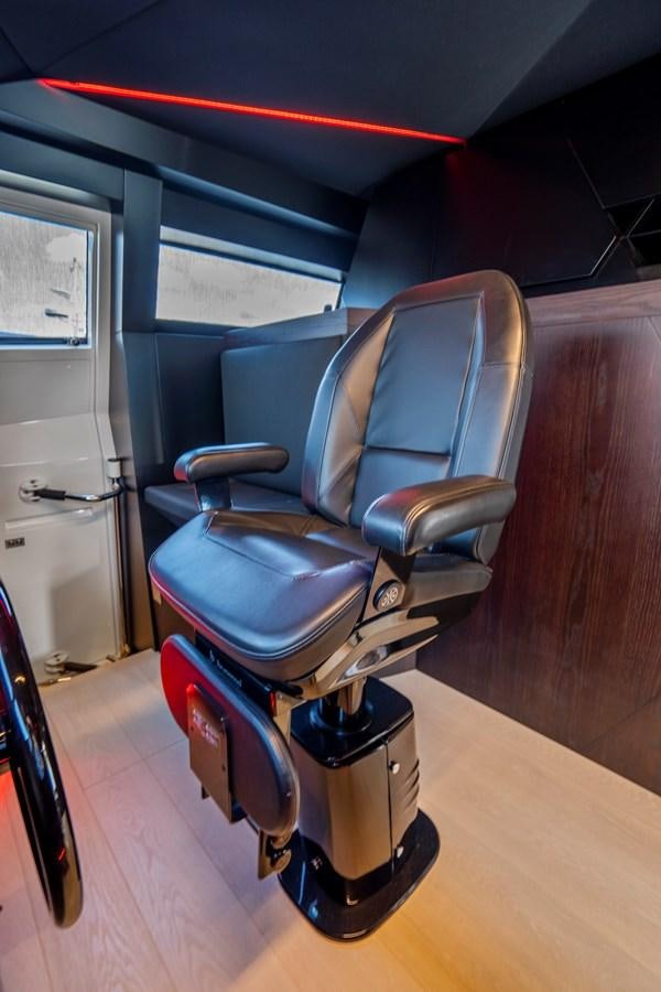 a blue and red exercise machine aboard PINCH ME Yacht for Sale