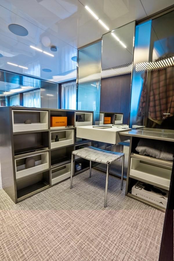 a room with a desk and shelves aboard PINCH ME Yacht for Sale