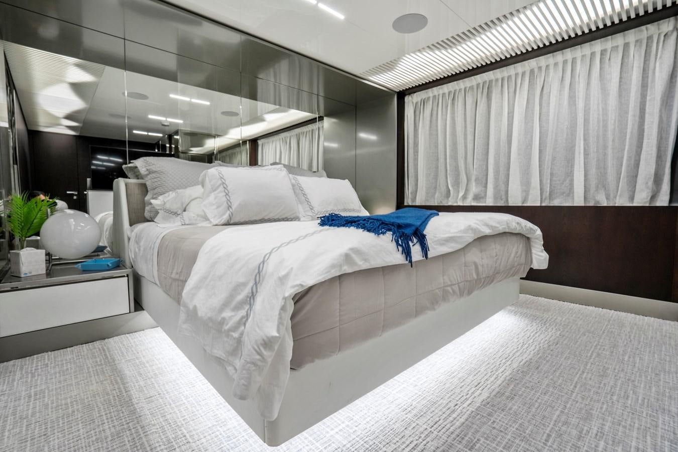 a bed with white sheets aboard PINCH ME Yacht for Sale