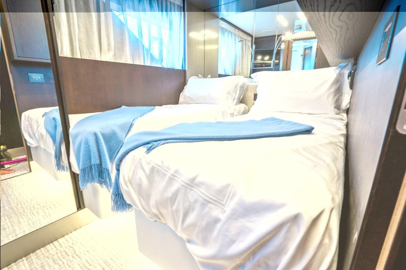 a bed with white sheets aboard PINCH ME Yacht for Sale