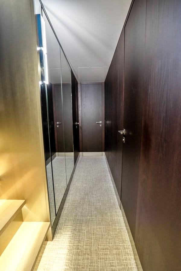 a hallway with doors aboard PINCH ME Yacht for Sale