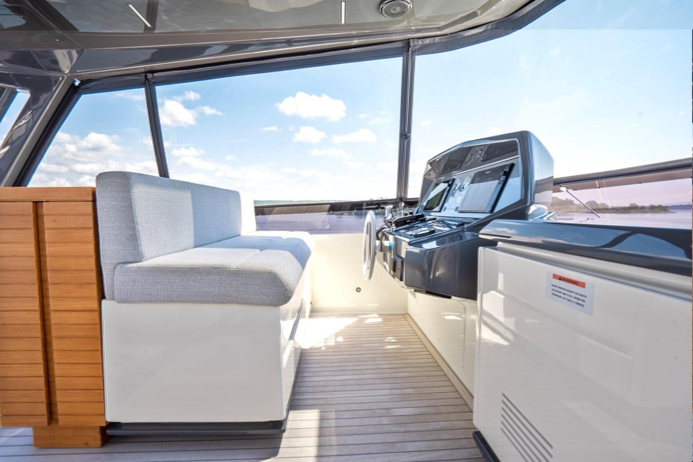 a car on a ferry aboard PINCH ME Yacht for Sale