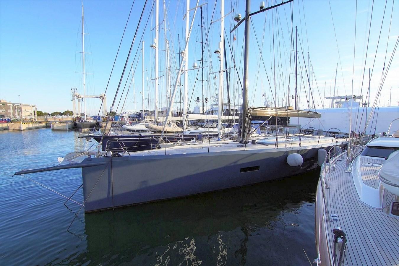 a group of boats are parked in a harbor aboard NYUMBA Yacht for Sale