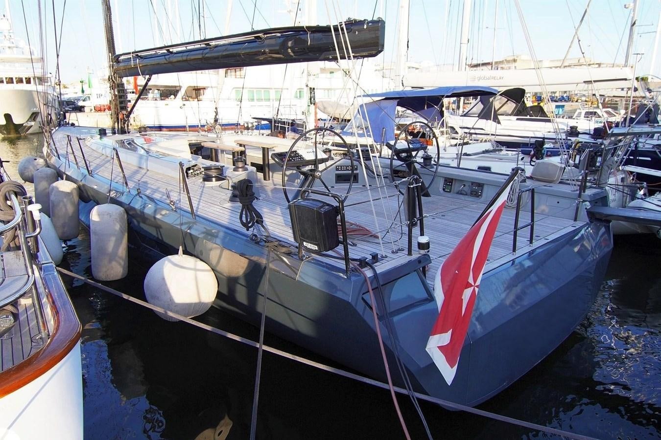 a boat in a harbor aboard NYUMBA Yacht for Sale