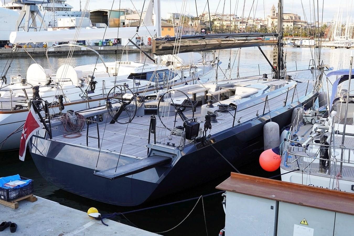 boats are parked in the harbor aboard NYUMBA Yacht for Sale