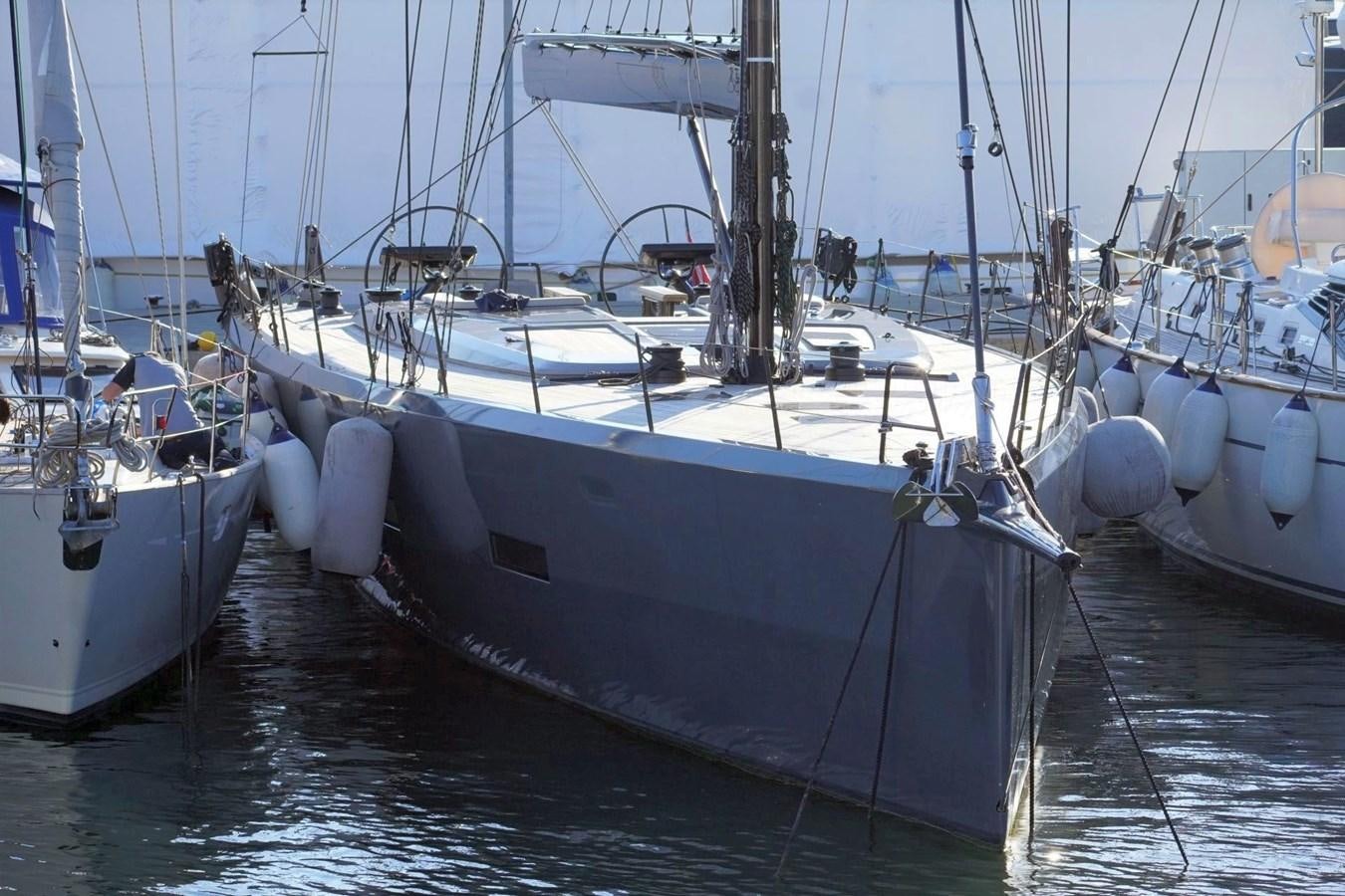 a group of boats in a harbor aboard NYUMBA Yacht for Sale