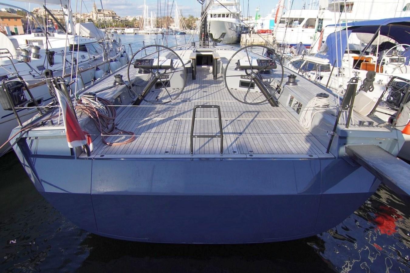 a group of boats are parked in a harbor aboard NYUMBA Yacht for Sale