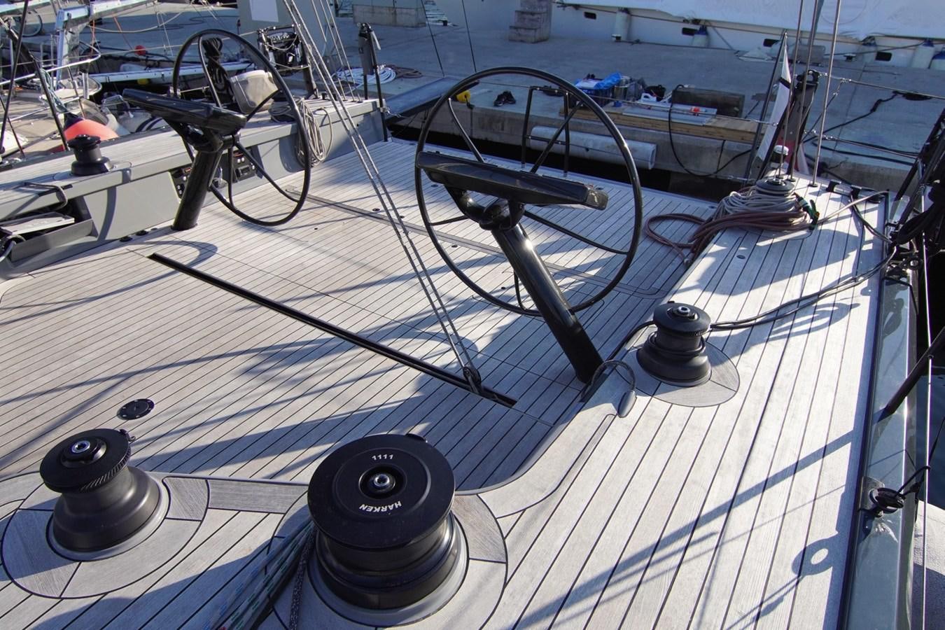 a large white boat with wheels aboard NYUMBA Yacht for Sale