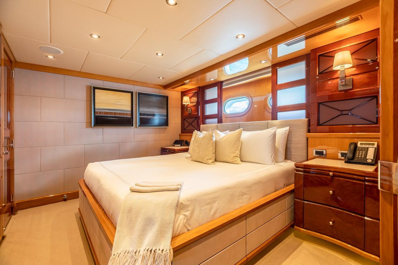 a hotel room with a bed aboard IMPROMPTU Yacht for Charter