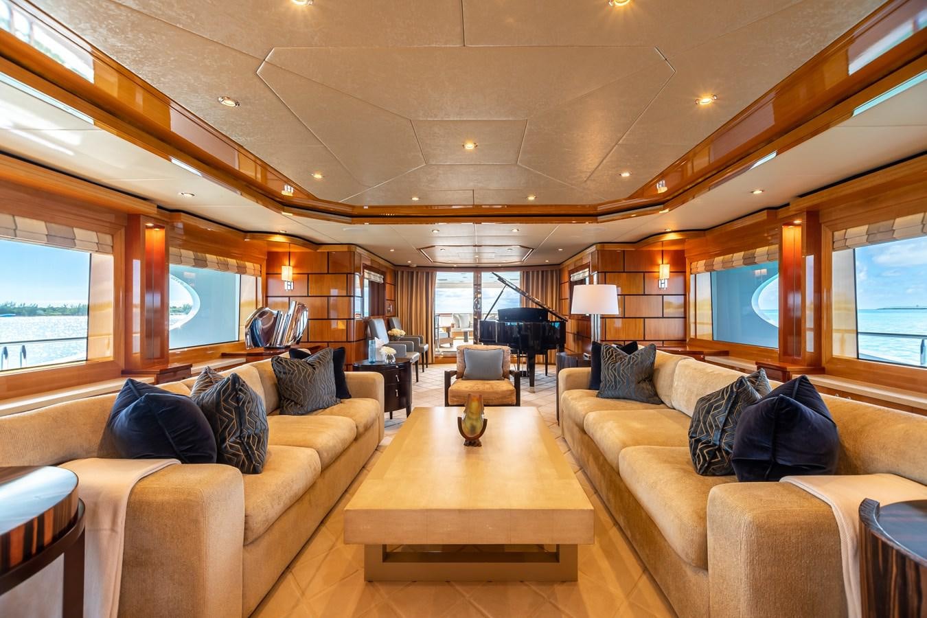 a living room with a large window aboard IMPROMPTU Yacht for Charter