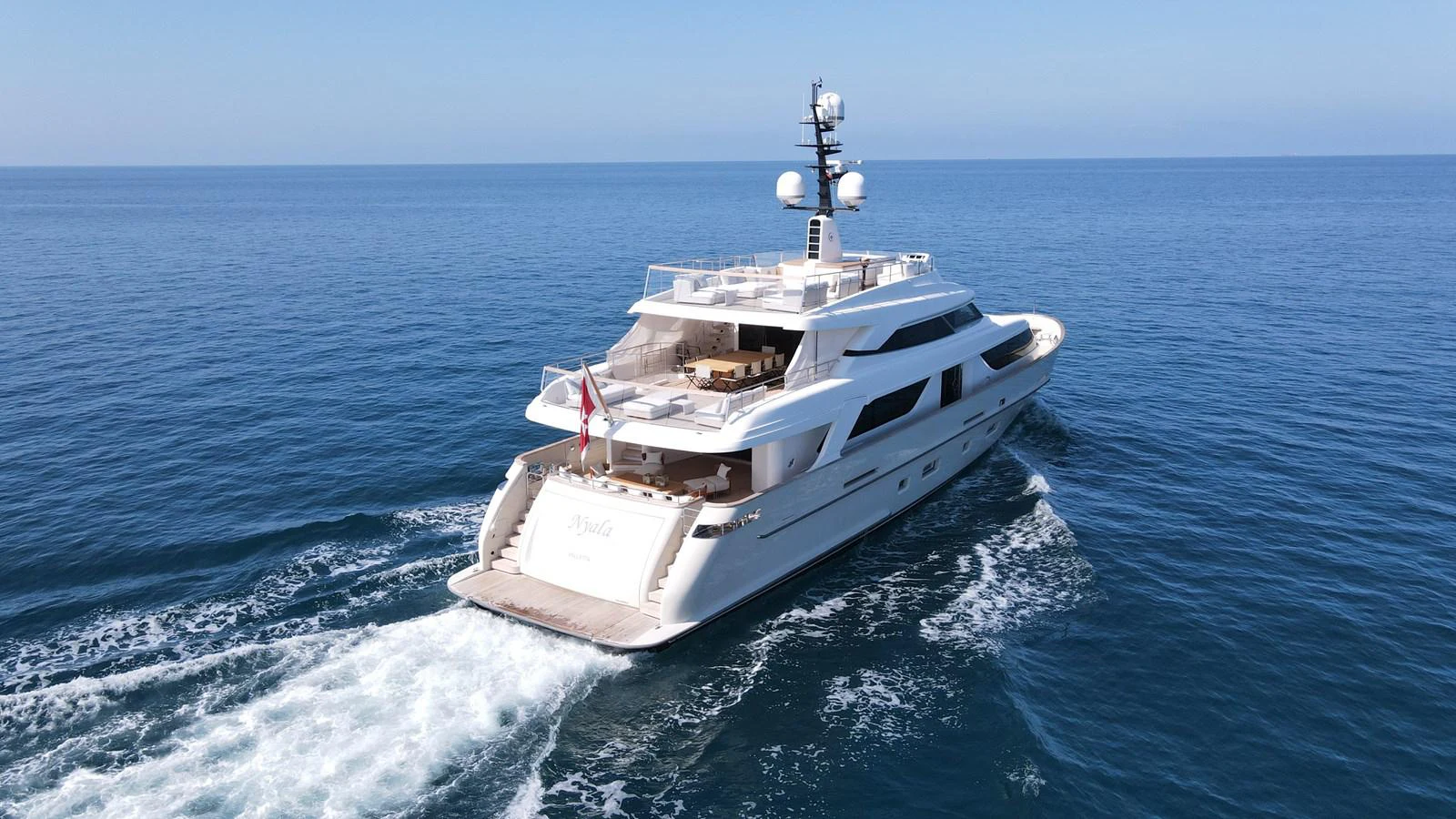 a white boat on the water aboard NYALA OF AFRICA Yacht for Sale