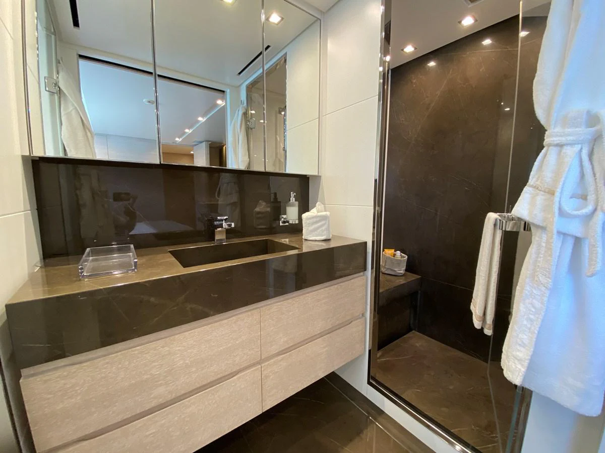 a bathroom with a large mirror aboard NYALA OF AFRICA Yacht for Sale
