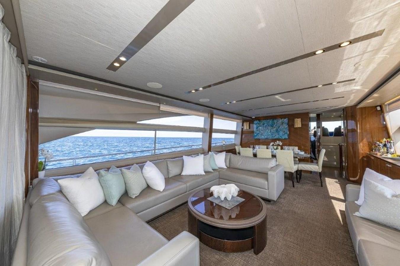 a living room with a large swimming pool aboard SIMPLER Yacht for Sale