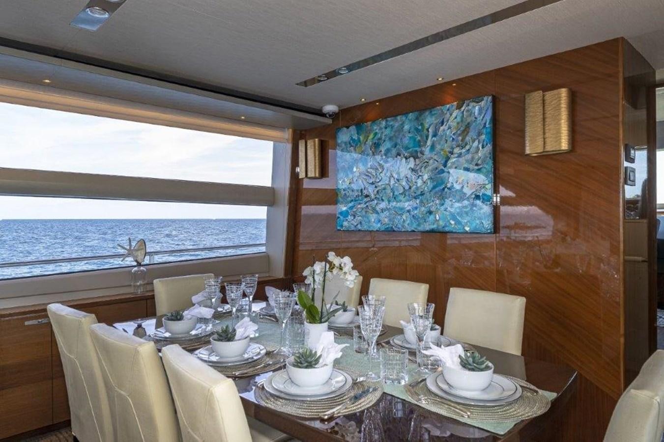 a table set for a dinner aboard SIMPLER Yacht for Sale