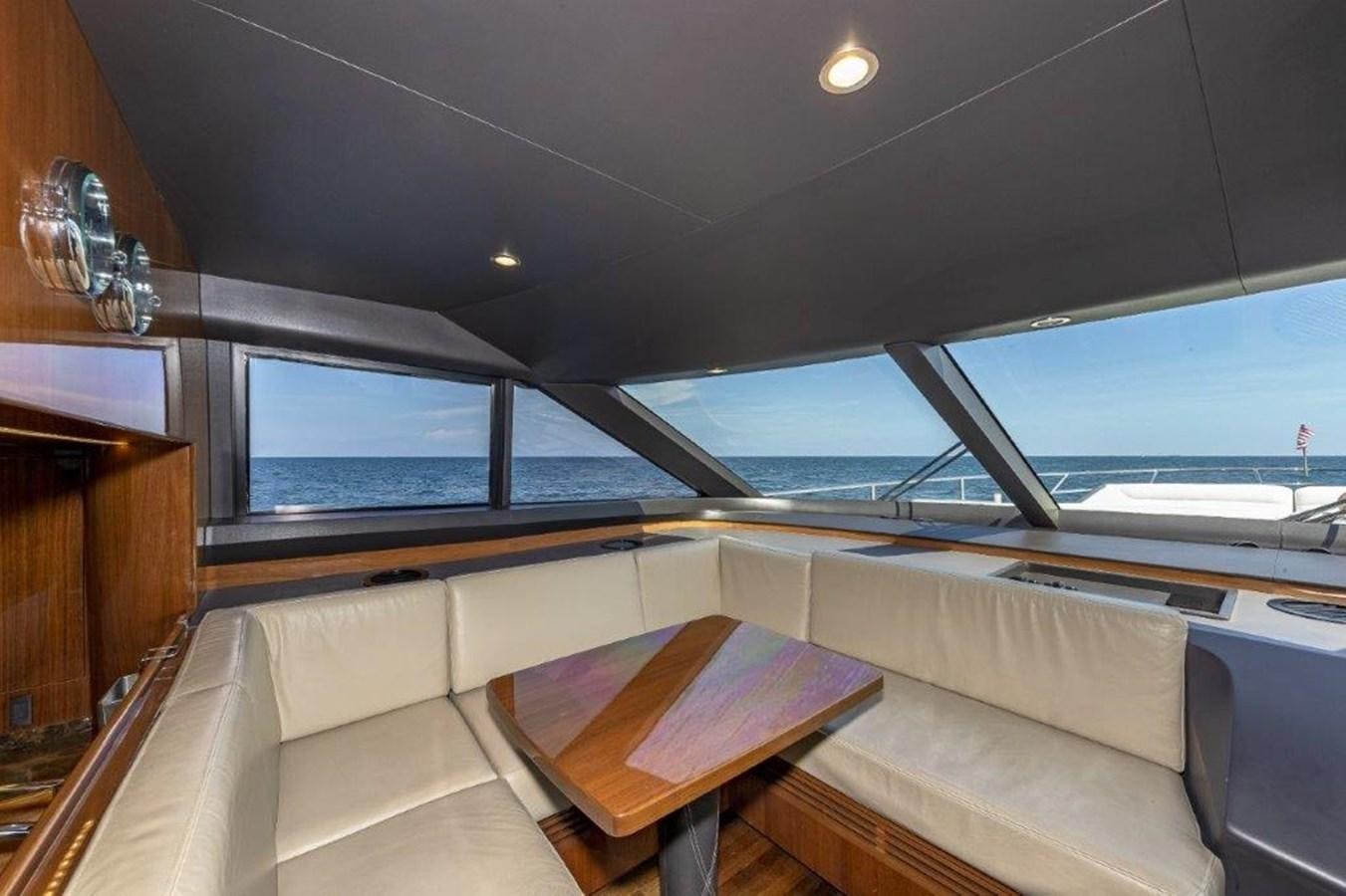 a boat with a table and a bench aboard SIMPLER Yacht for Sale