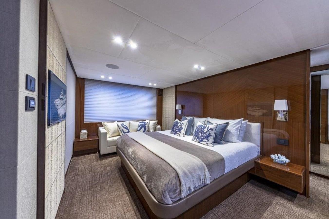 a bedroom with two beds aboard SIMPLER Yacht for Sale
