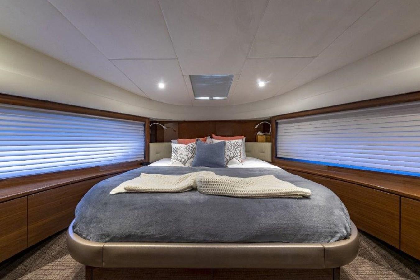 a bed in a room aboard SIMPLER Yacht for Sale