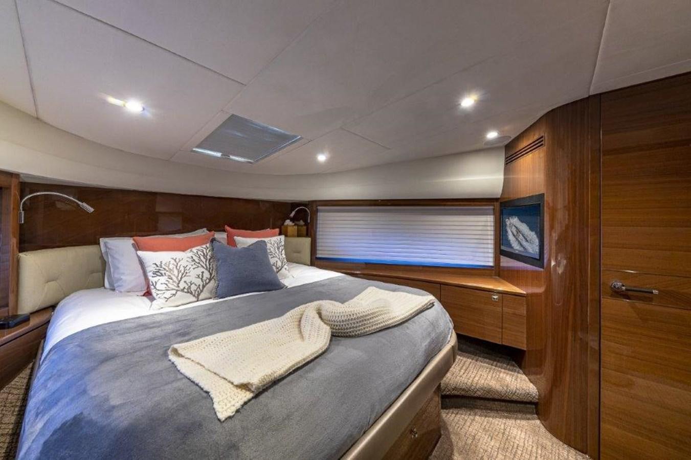 a bed in a room aboard SIMPLER Yacht for Sale