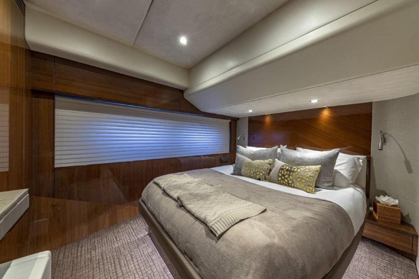 a bed in a room aboard SIMPLER Yacht for Sale