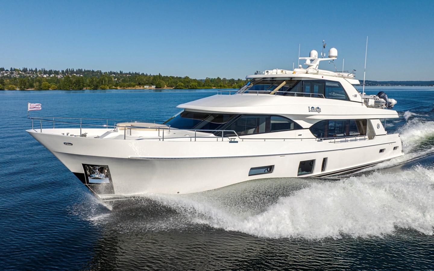 a white yacht on water aboard LANIKAI Yacht for Sale