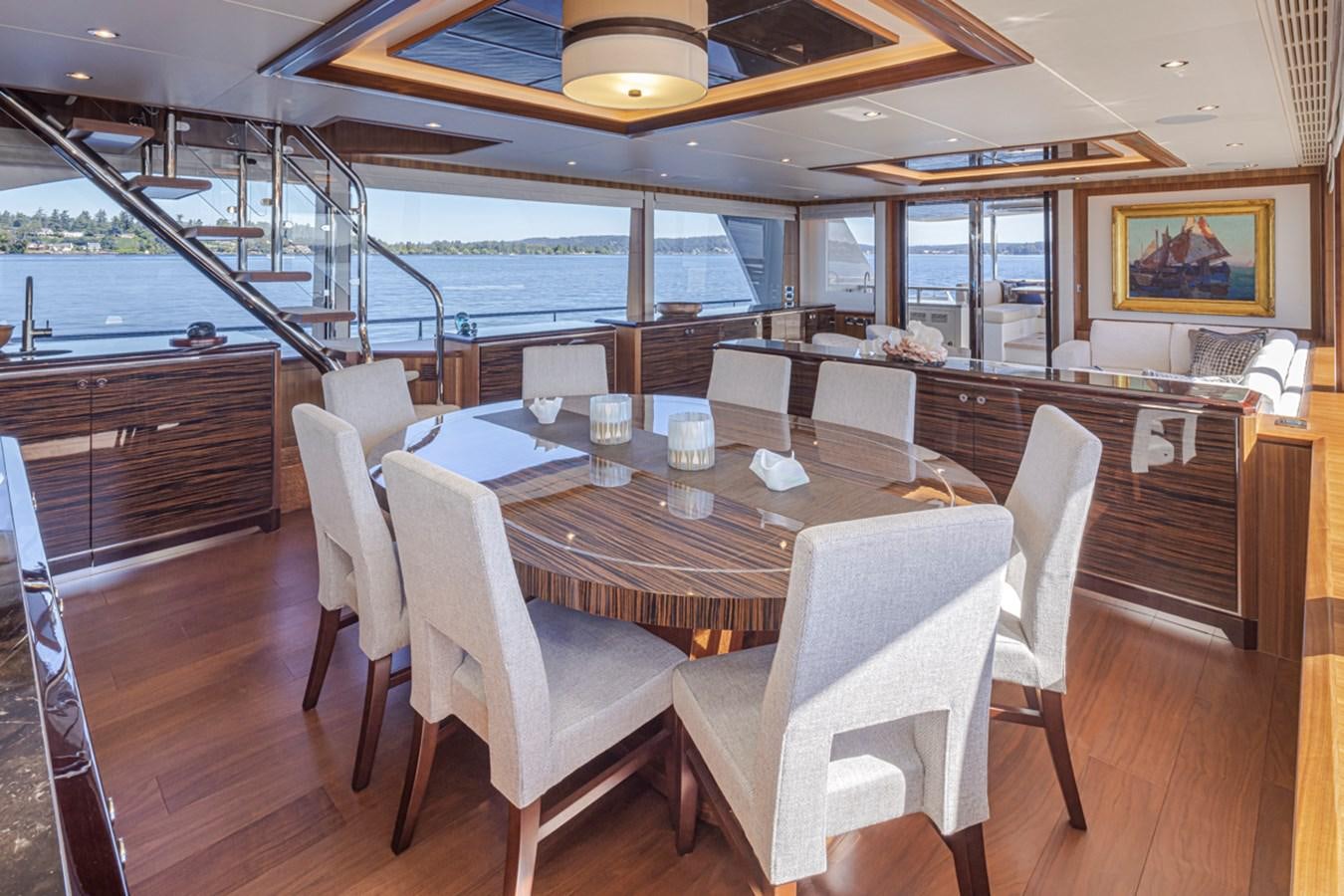 a dining table in a room aboard LANIKAI Yacht for Sale