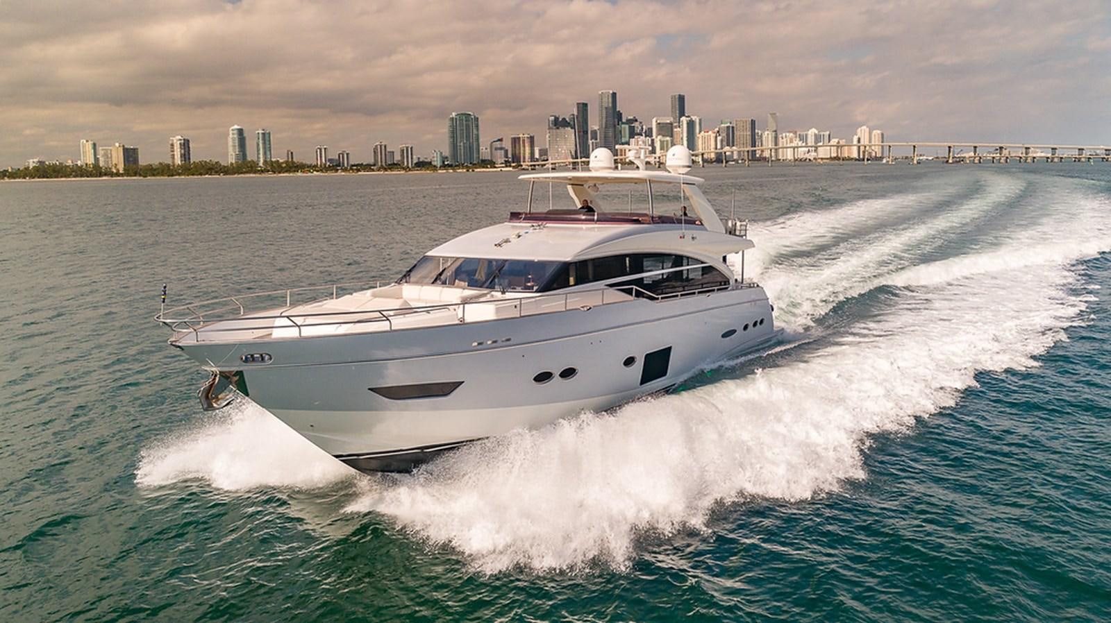 a white yacht on water aboard 88' PRINCESS 2015 Yacht for Sale