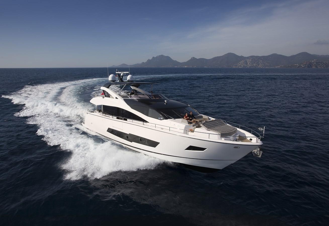a white yacht on the water aboard RIANNA Yacht for Sale