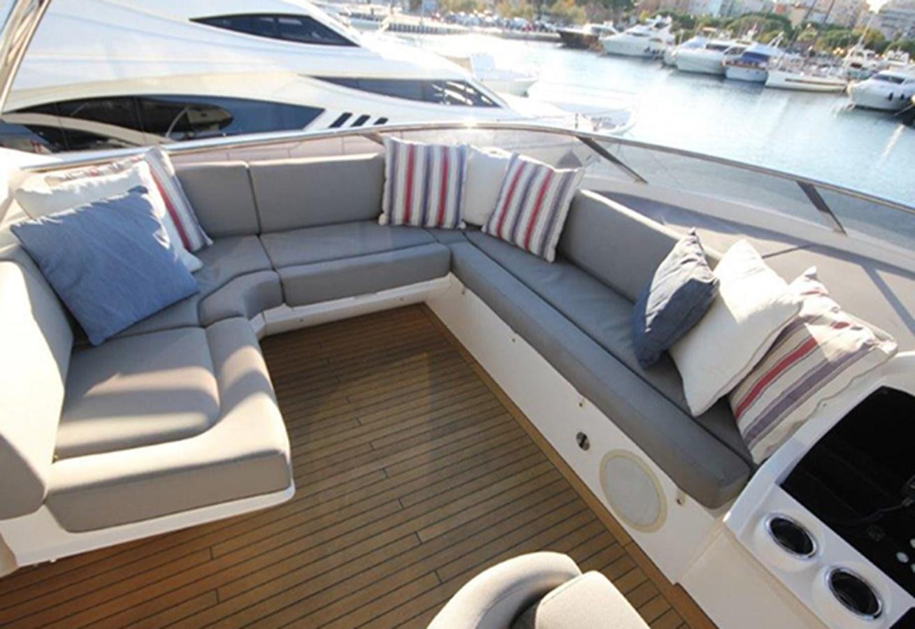 a car with a deck and a view of a city aboard MIBOWT Yacht for Sale