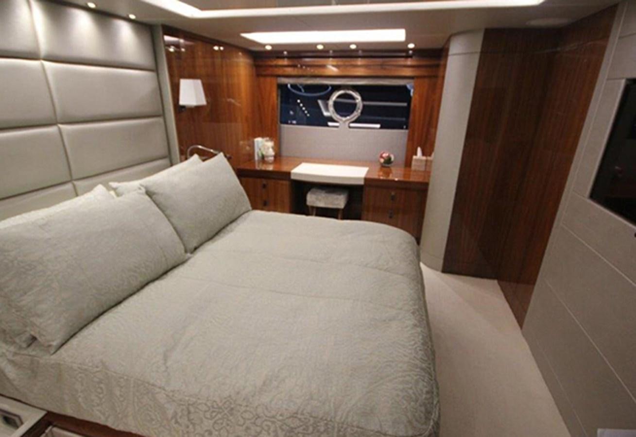 a bed in a room aboard MIBOWT Yacht for Sale