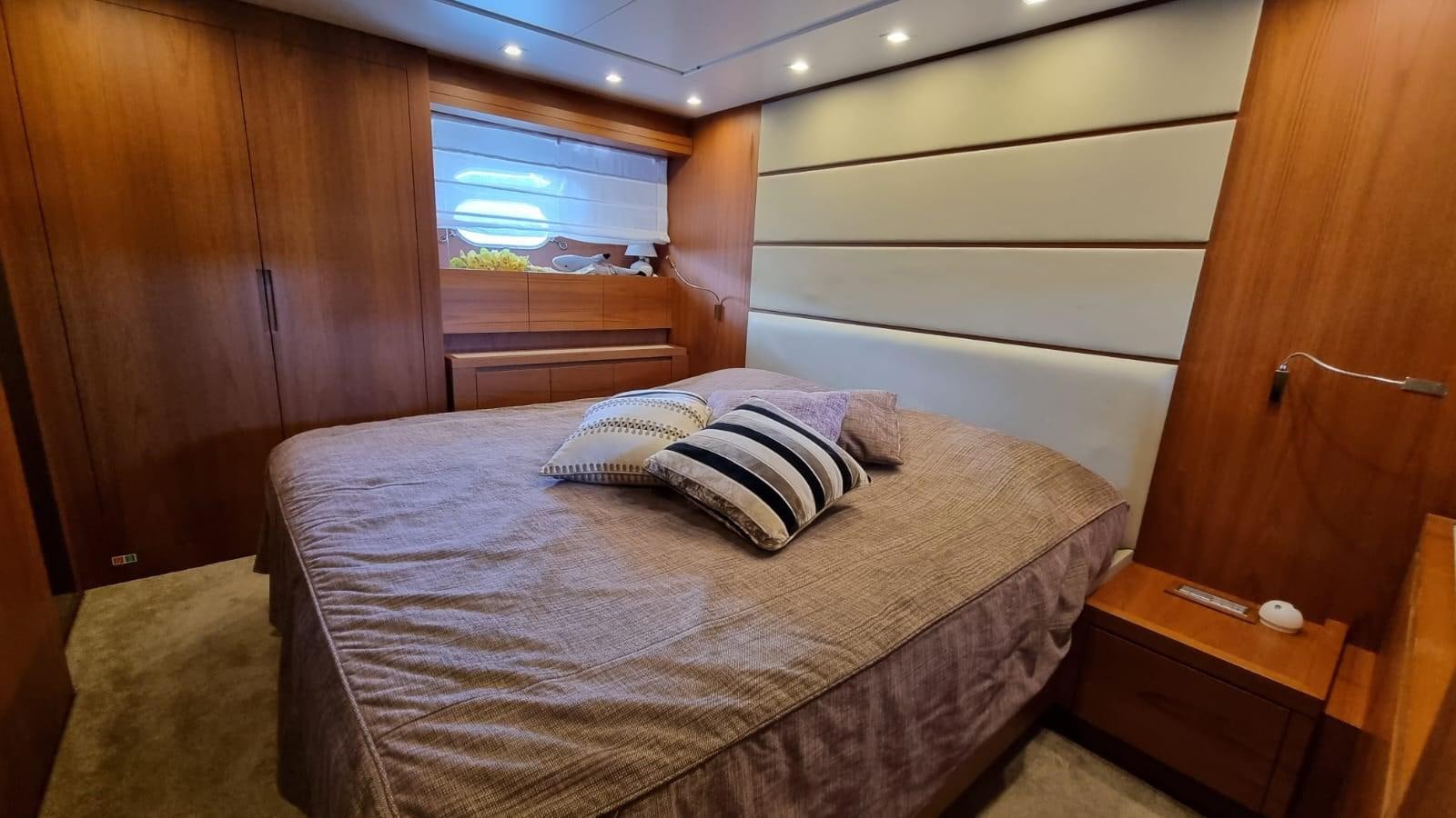 a bed in a room aboard DOUBLE B Yacht for Sale