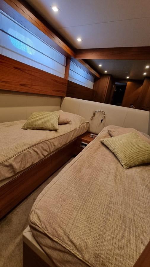 a couple of beds in a room aboard DOUBLE B Yacht for Sale