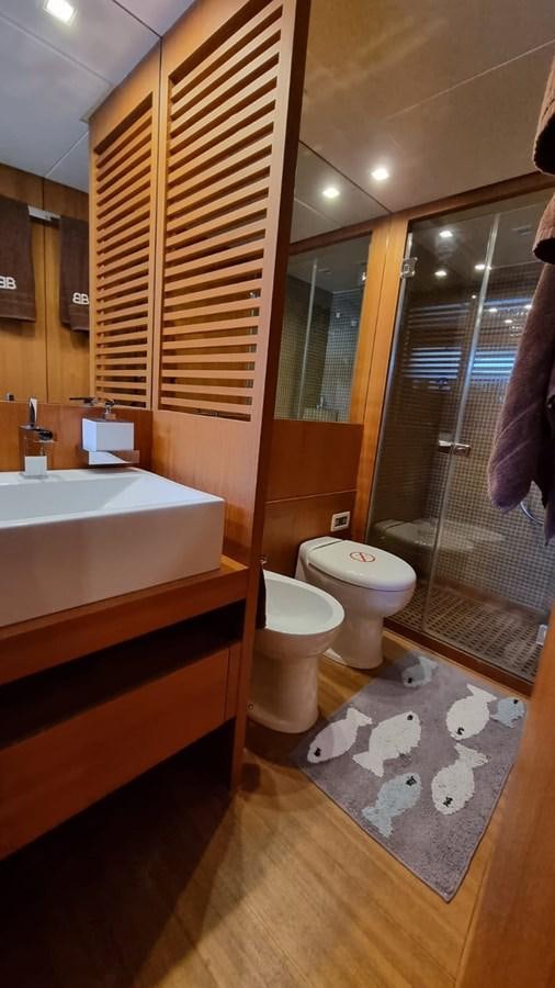 a bathroom with a sink toilet and a shower aboard DOUBLE B Yacht for Sale