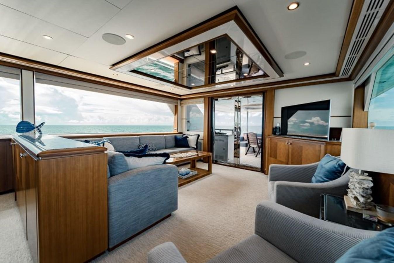 a living room with a large window aboard SWEET SALT Yacht for Sale