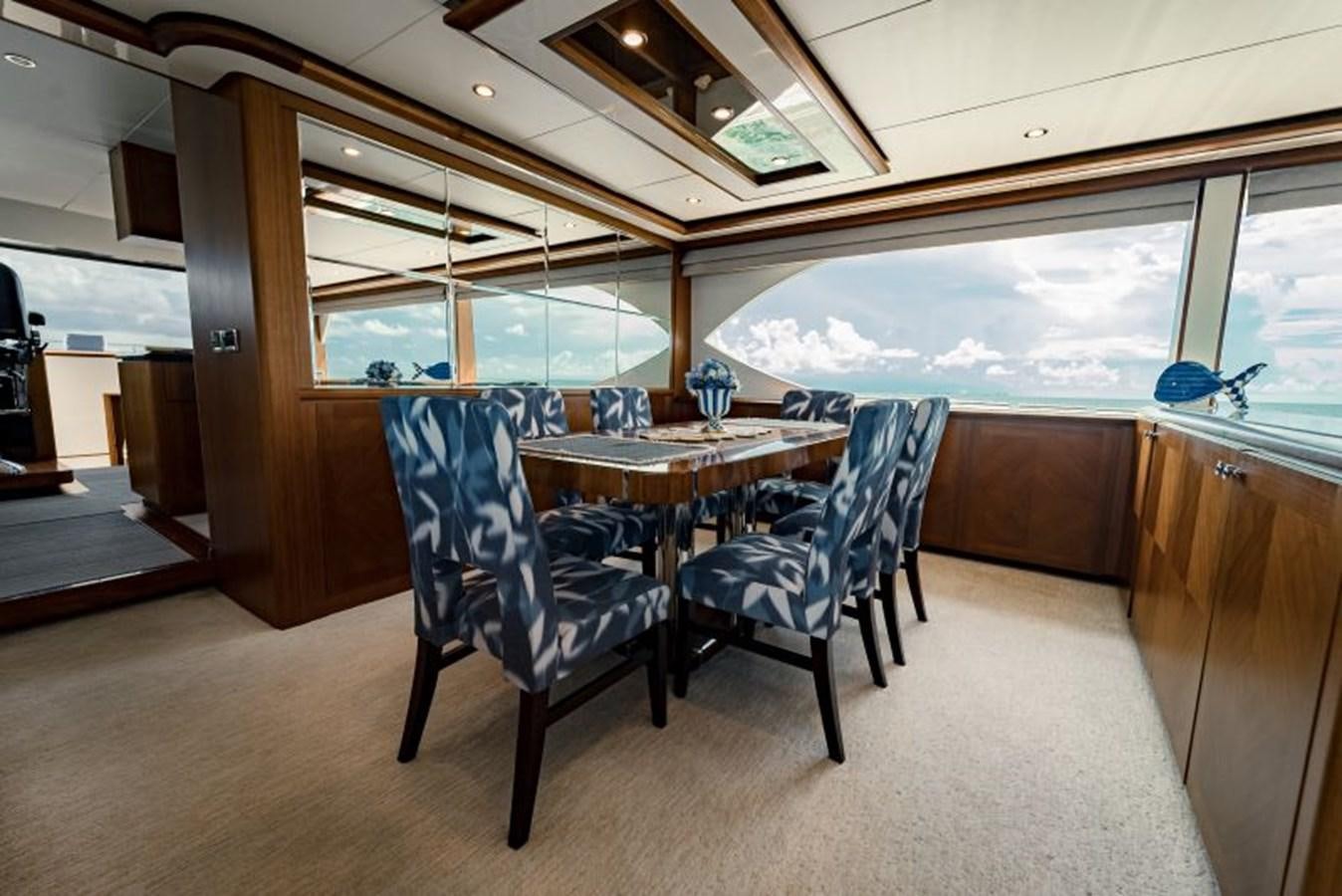 a table and chairs in a room aboard SWEET SALT Yacht for Sale