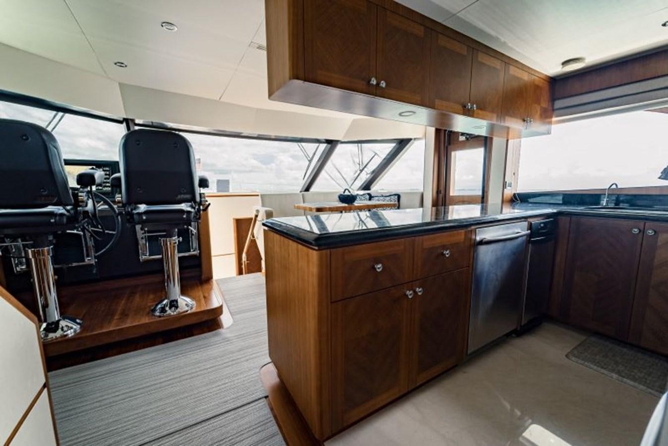 a kitchen with a large island aboard SWEET SALT Yacht for Sale