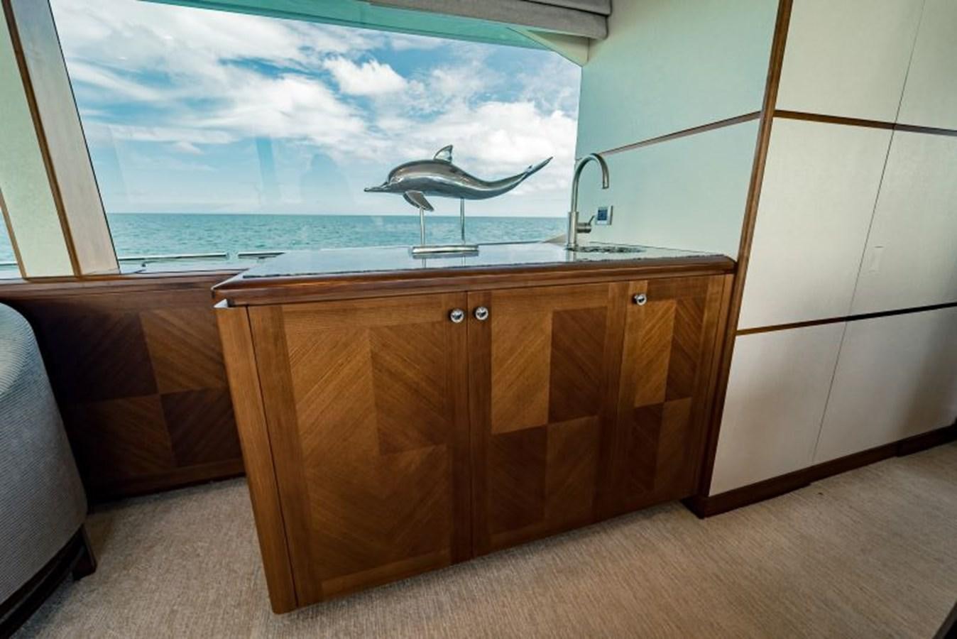 a bathroom with a large window aboard SWEET SALT Yacht for Sale