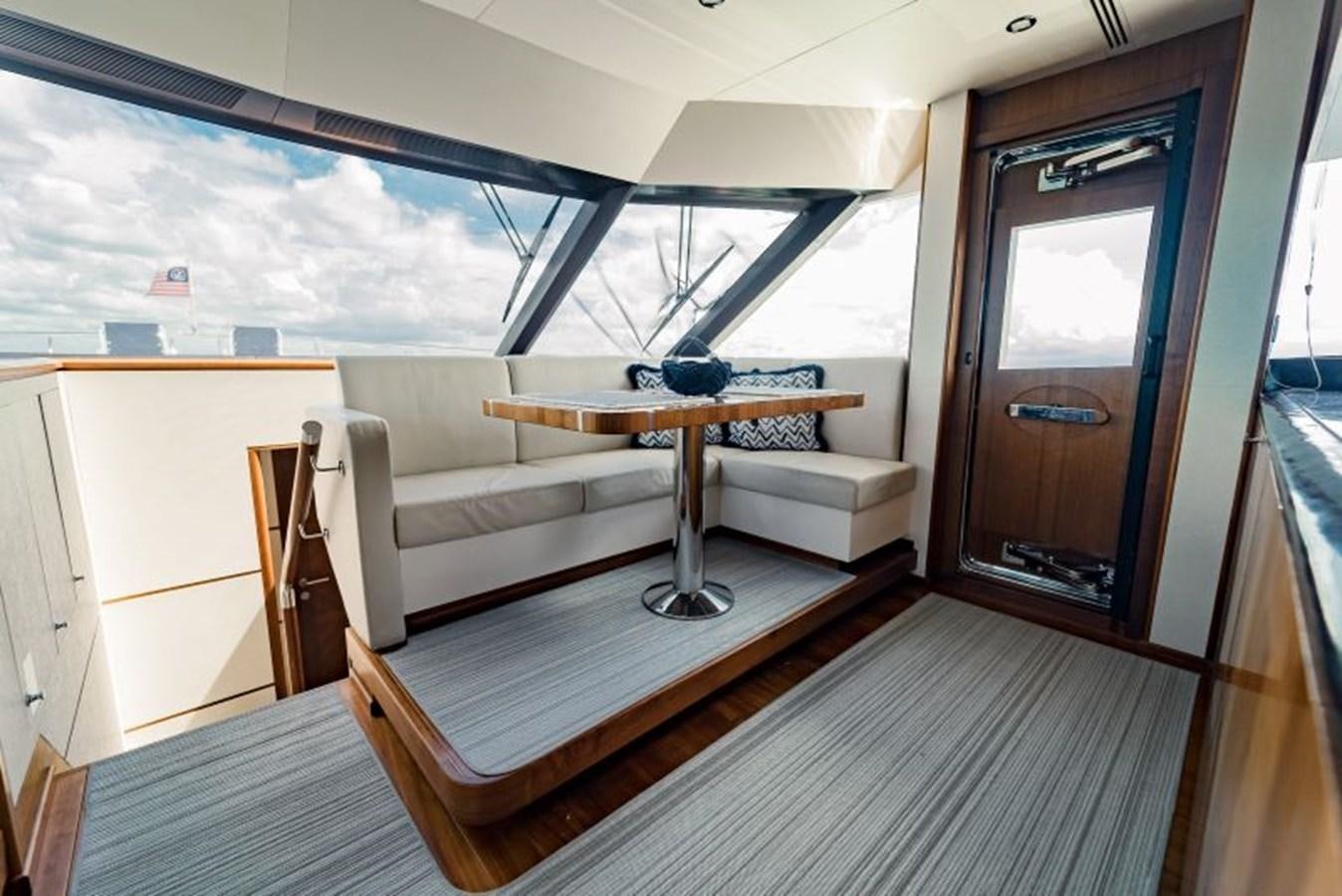 a room with a bed and a table aboard SWEET SALT Yacht for Sale