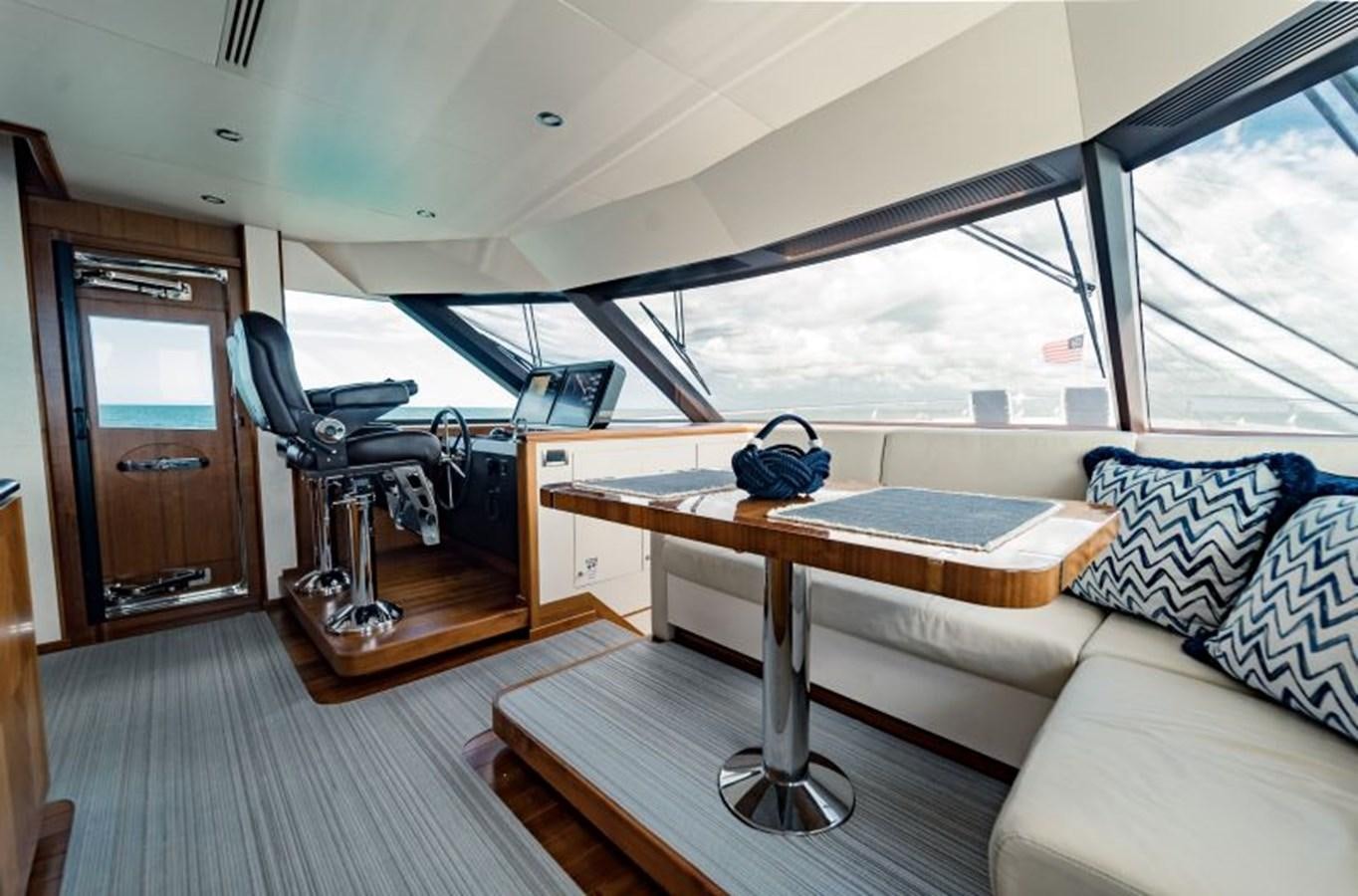 a room with a couch and a table aboard SWEET SALT Yacht for Sale