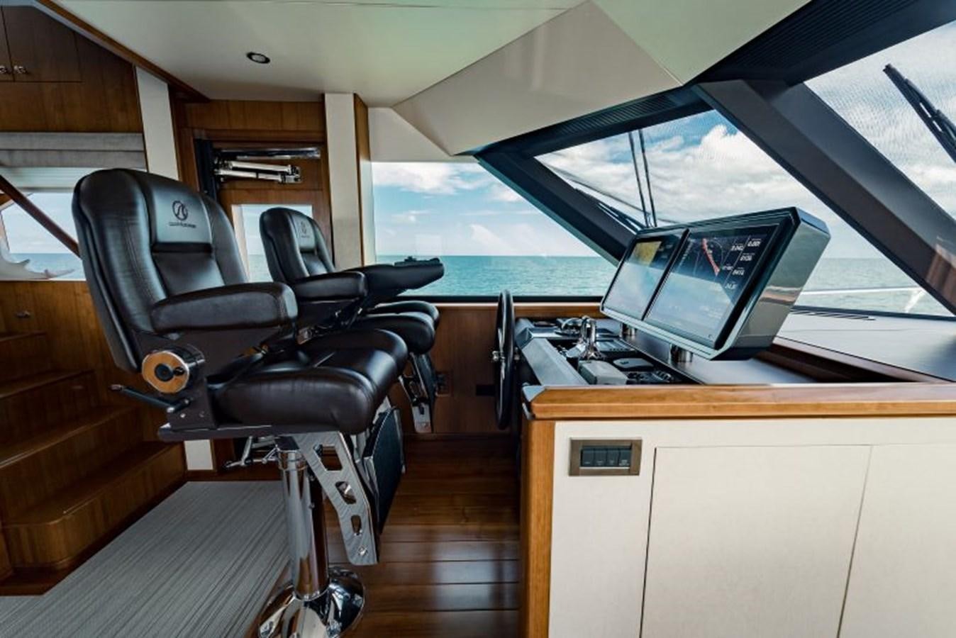 a room with a desk and a computer aboard SWEET SALT Yacht for Sale
