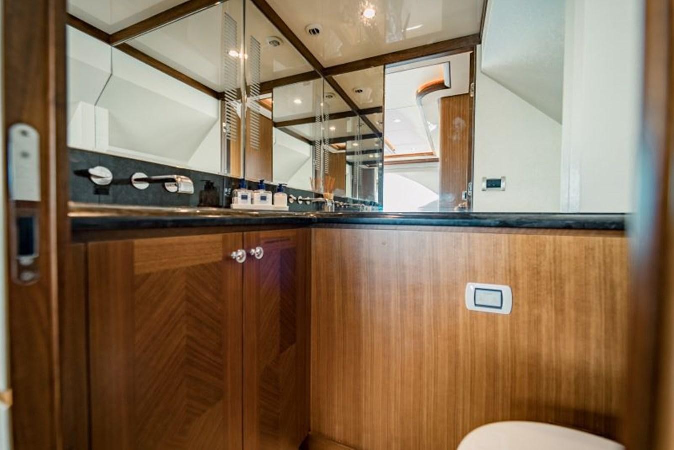 a kitchen with a sink and cabinets aboard SWEET SALT Yacht for Sale