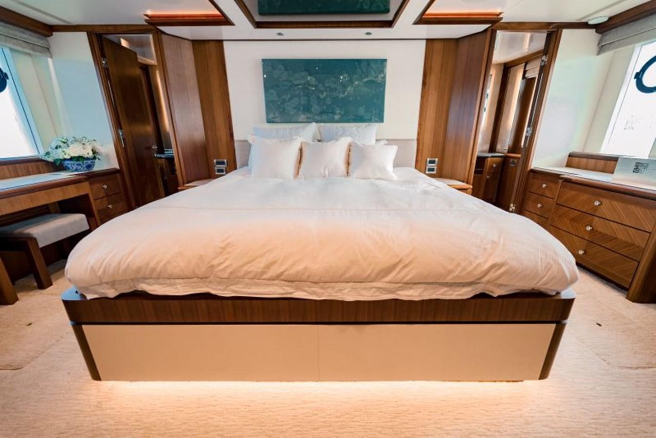 a bed with white sheets aboard SWEET SALT Yacht for Sale